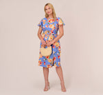 Plus Size Flutter Sleeve Floral Print Dress With Tie Front In Peri Multi 1