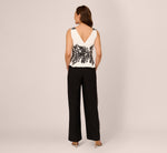 Sleeveless Peplum Jumpsuit With Scroll Lace Details In Ivory Black 5